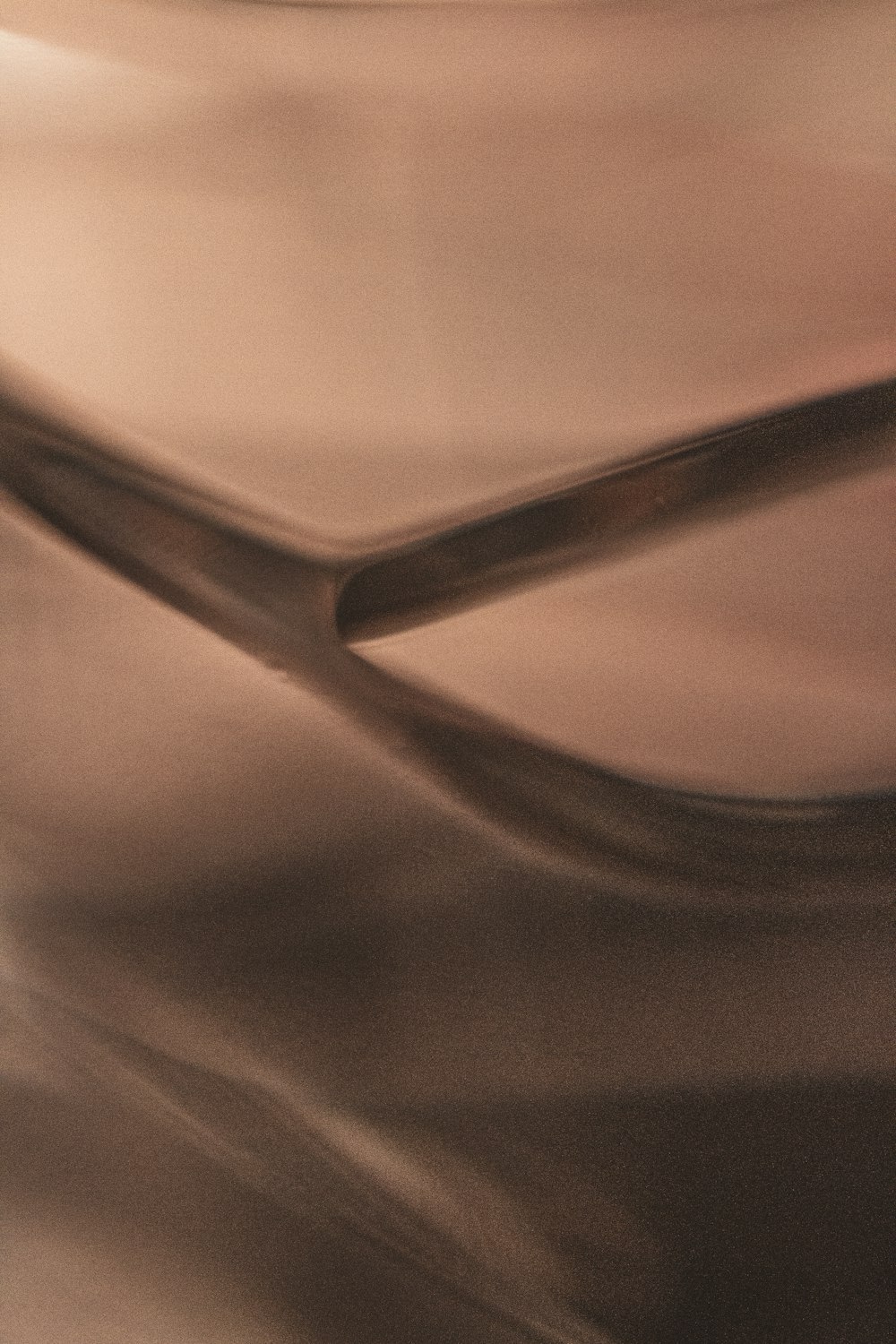 a blurry photograph of a curved object