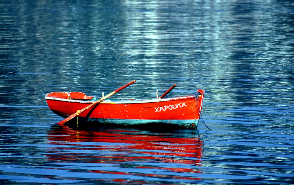 a small boat in a body of water