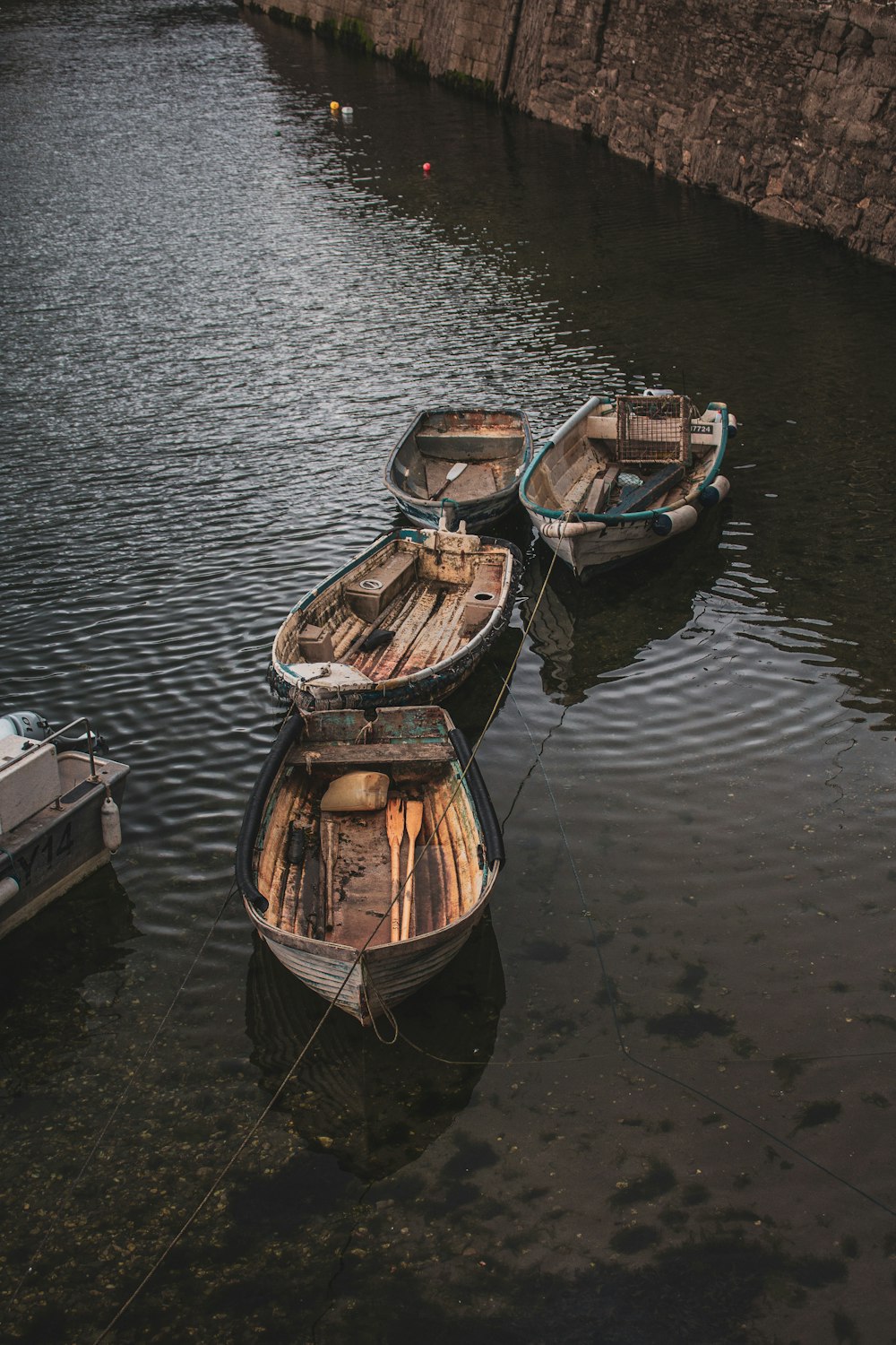 a couple of boats that are sitting in the water