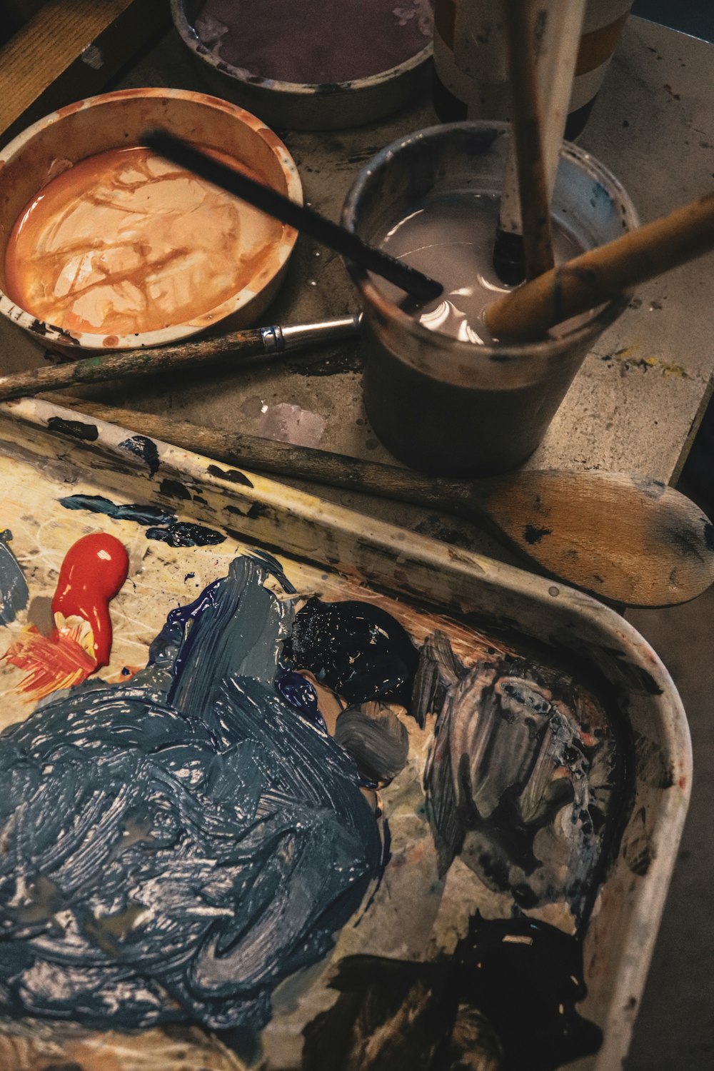 a painting of a man is being displayed on a table