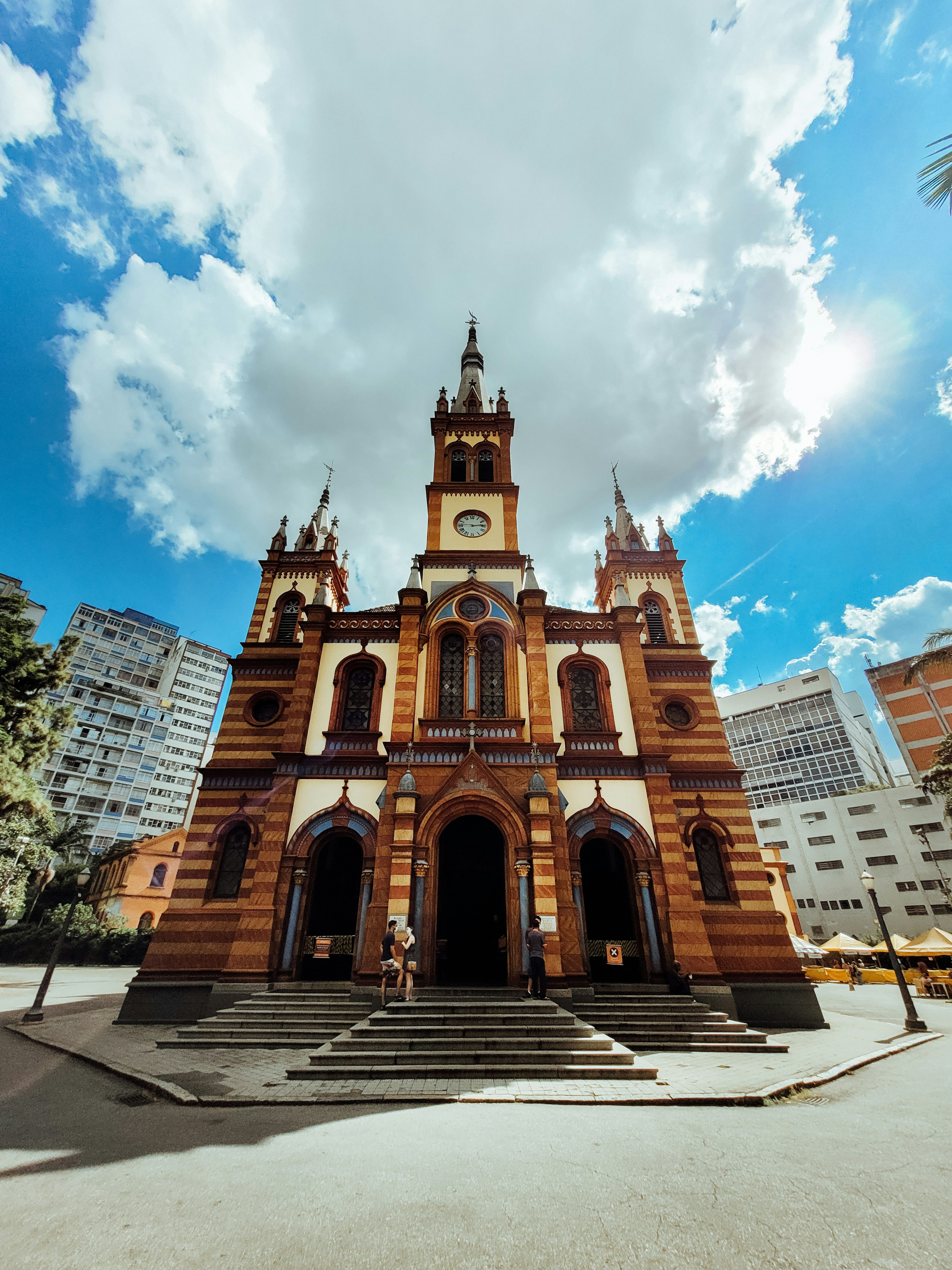 a large church with a clock on the front of it
