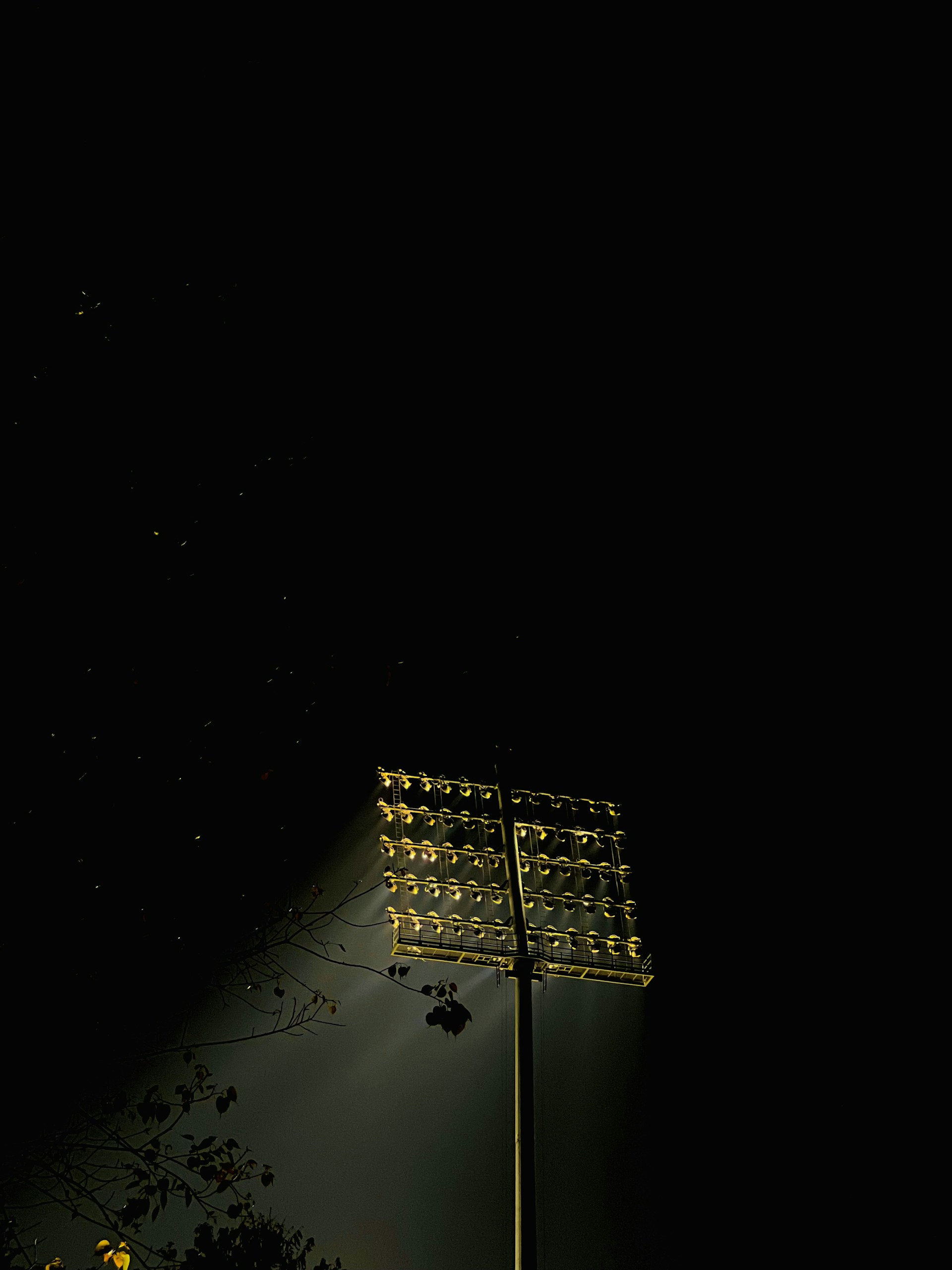 a street light is lit up at night