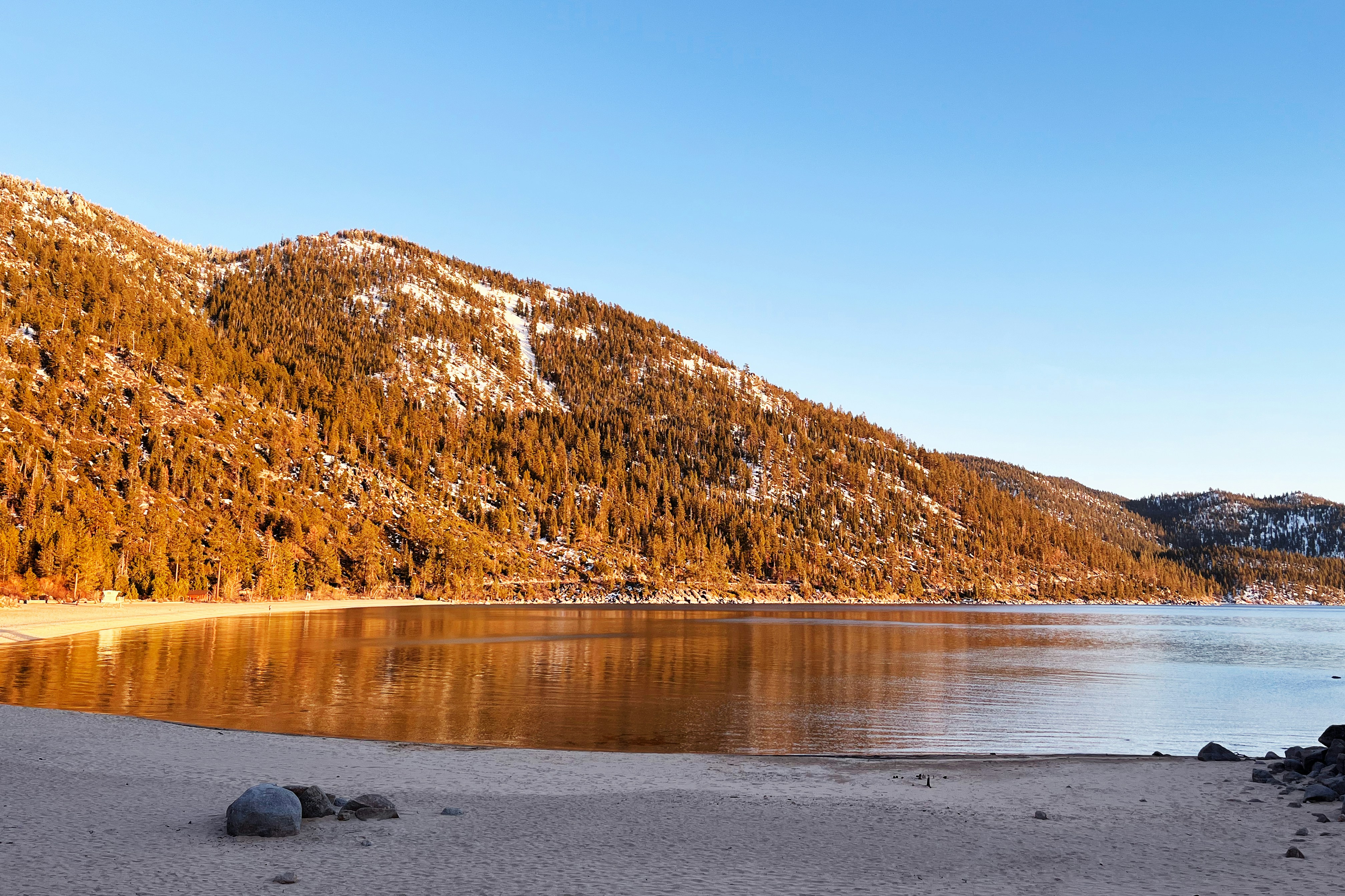 a large body of water surrounded by mountains