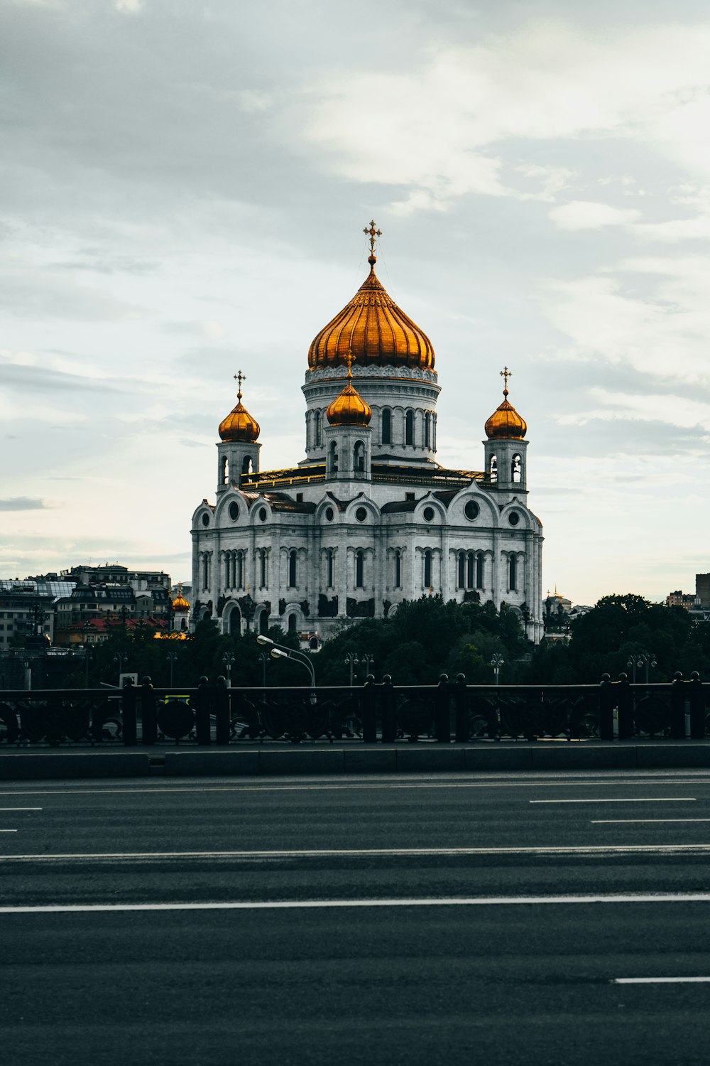 a large white building with a golden dome