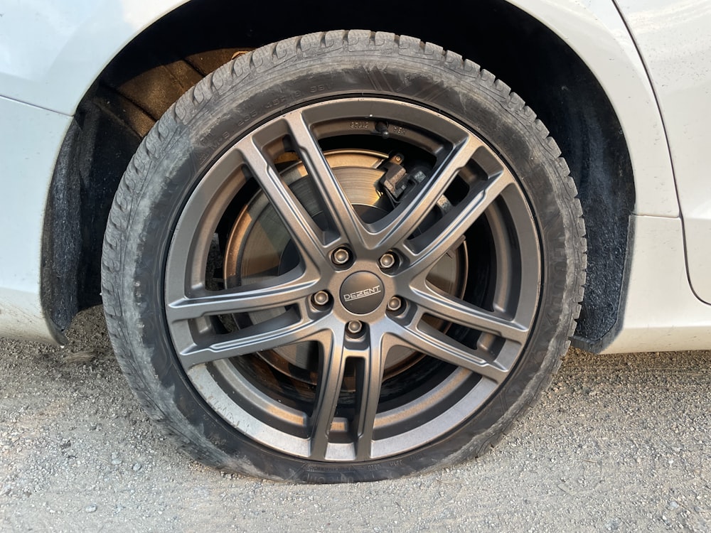 a close up of a tire on a car