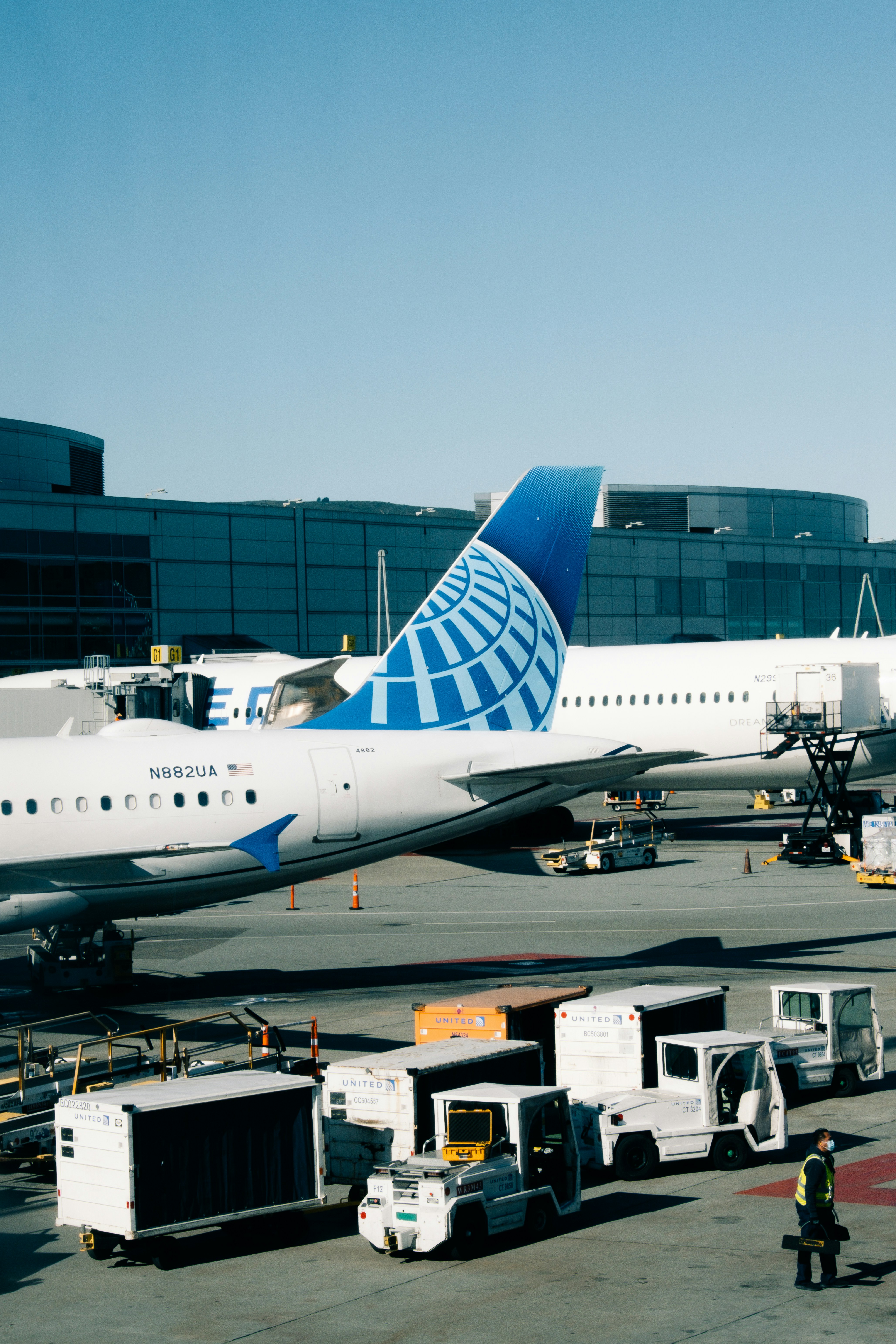 a large jetliner sitting on top of an airport tarmac