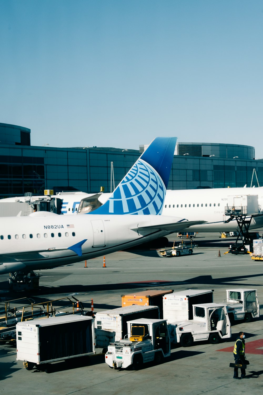 a large jetliner sitting on top of an airport tarmac