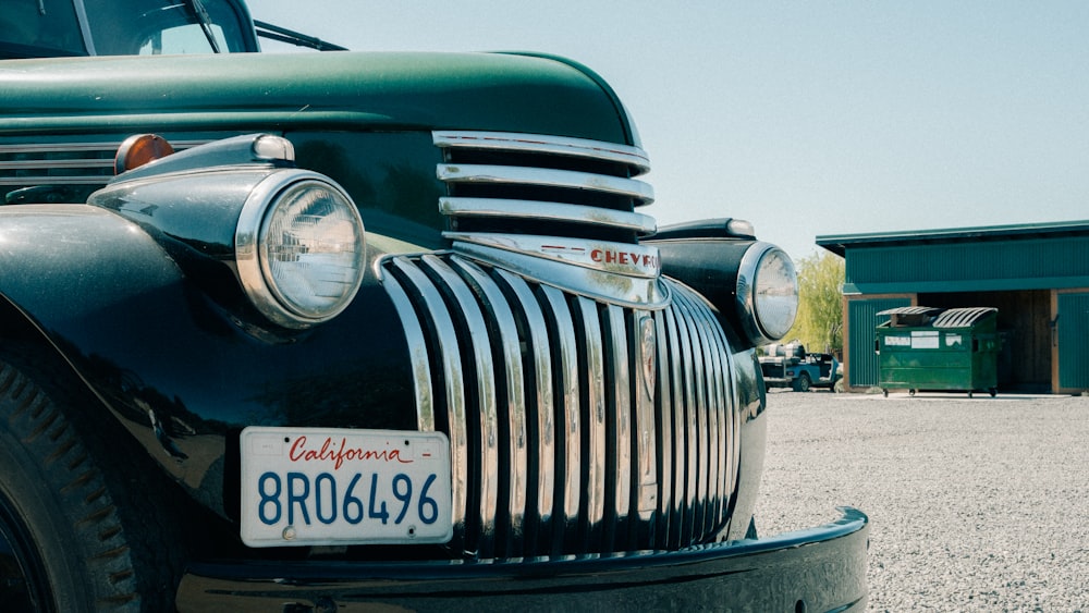 a close up of the front of an old truck