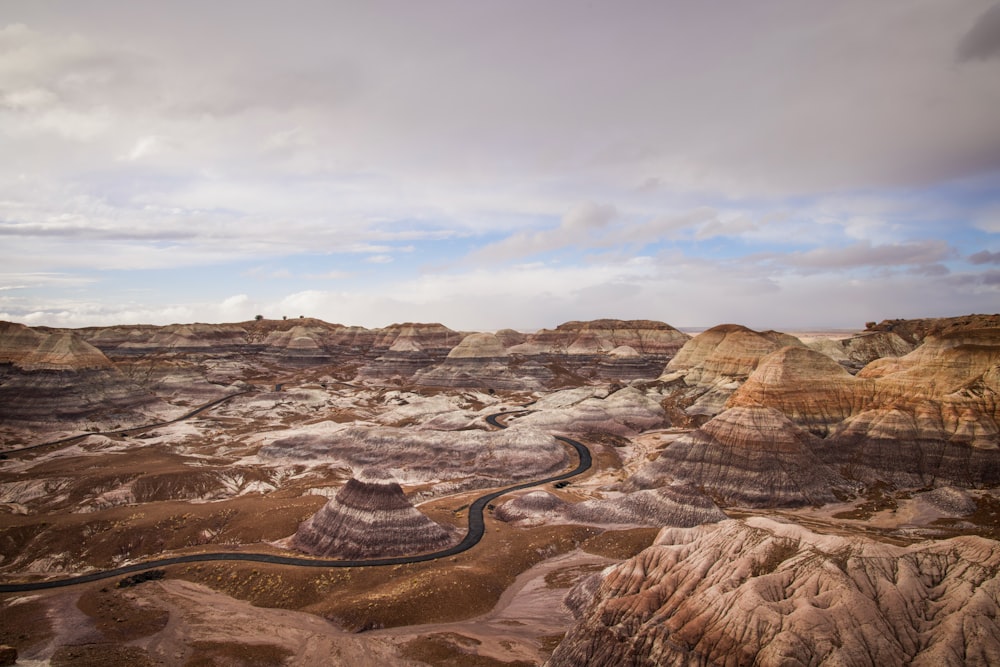 a winding road in the middle of a desert