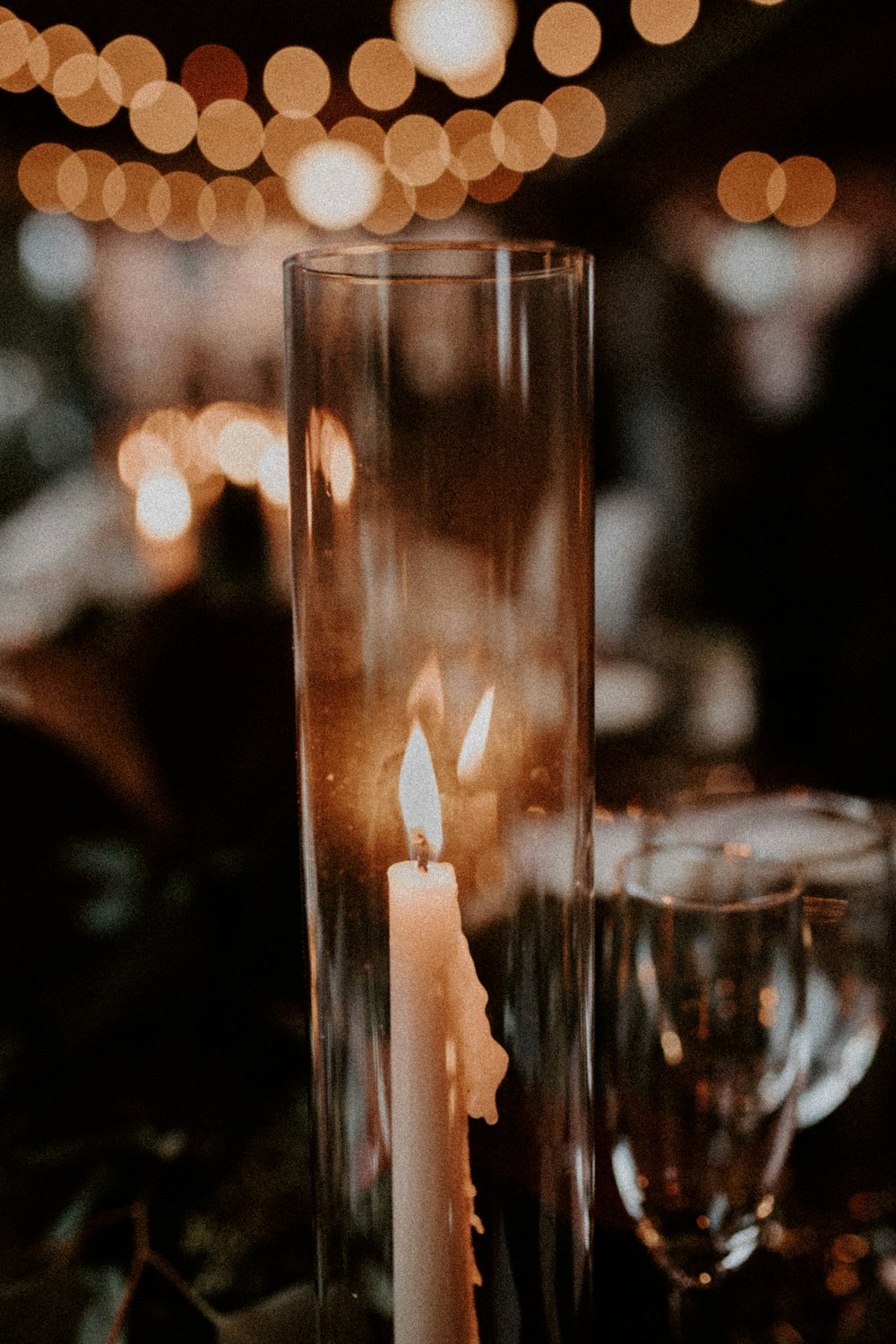 a candle that is sitting in a glass