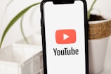 a cell phone with a youtube logo on it