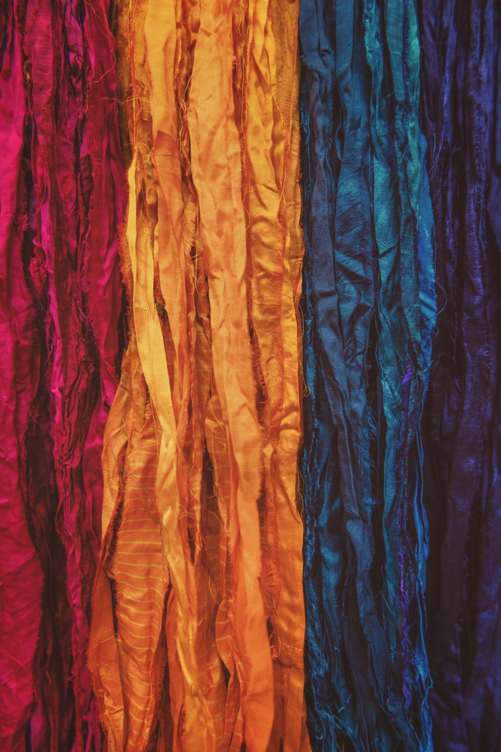 a close up of a multi colored curtain