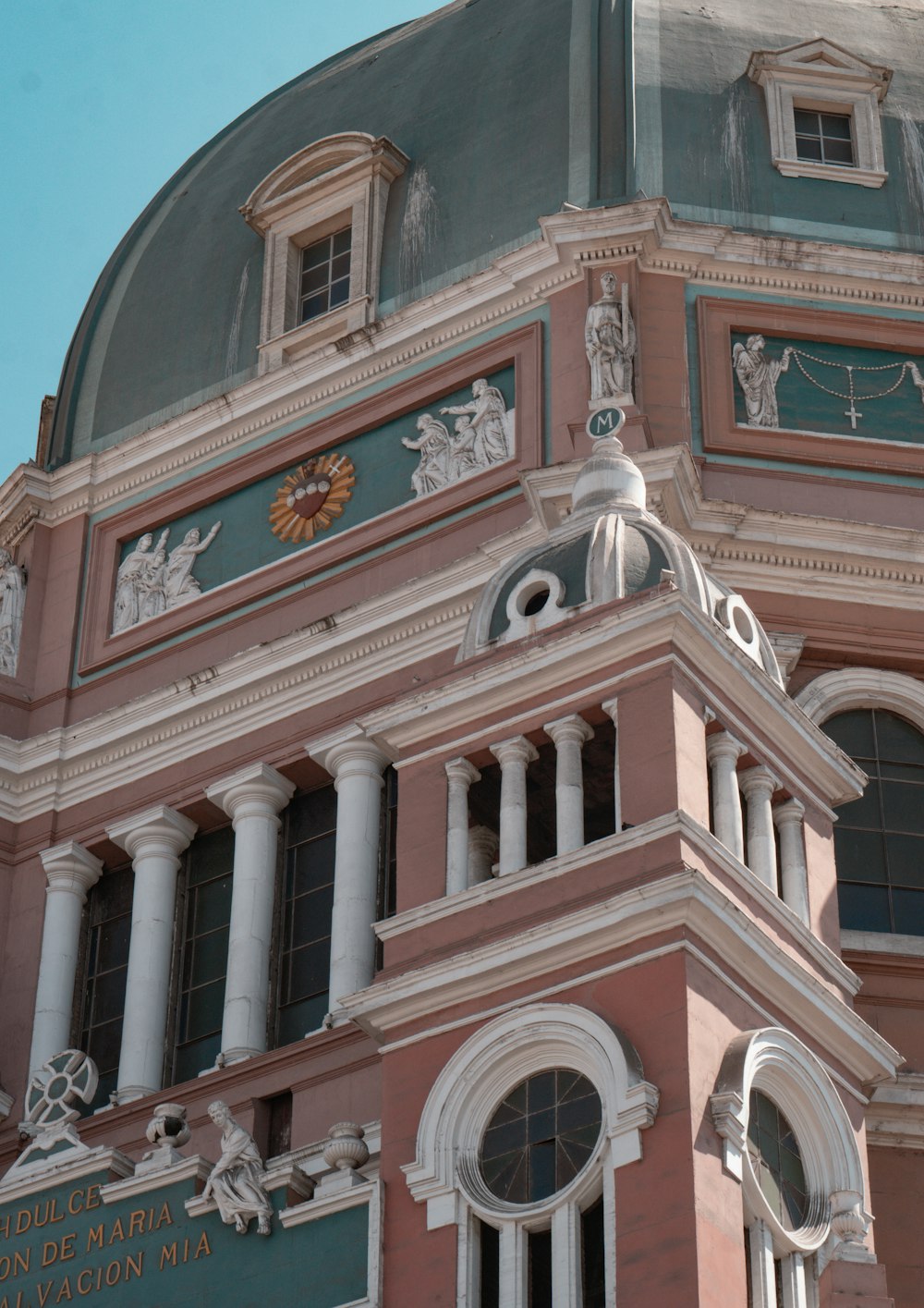 a large building with a clock on it's side