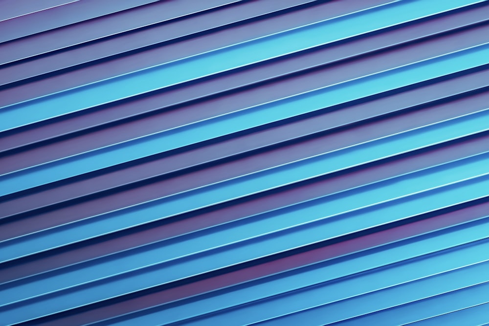 a close up of a blue wall with vertical lines