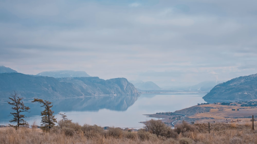 a large body of water surrounded by mountains