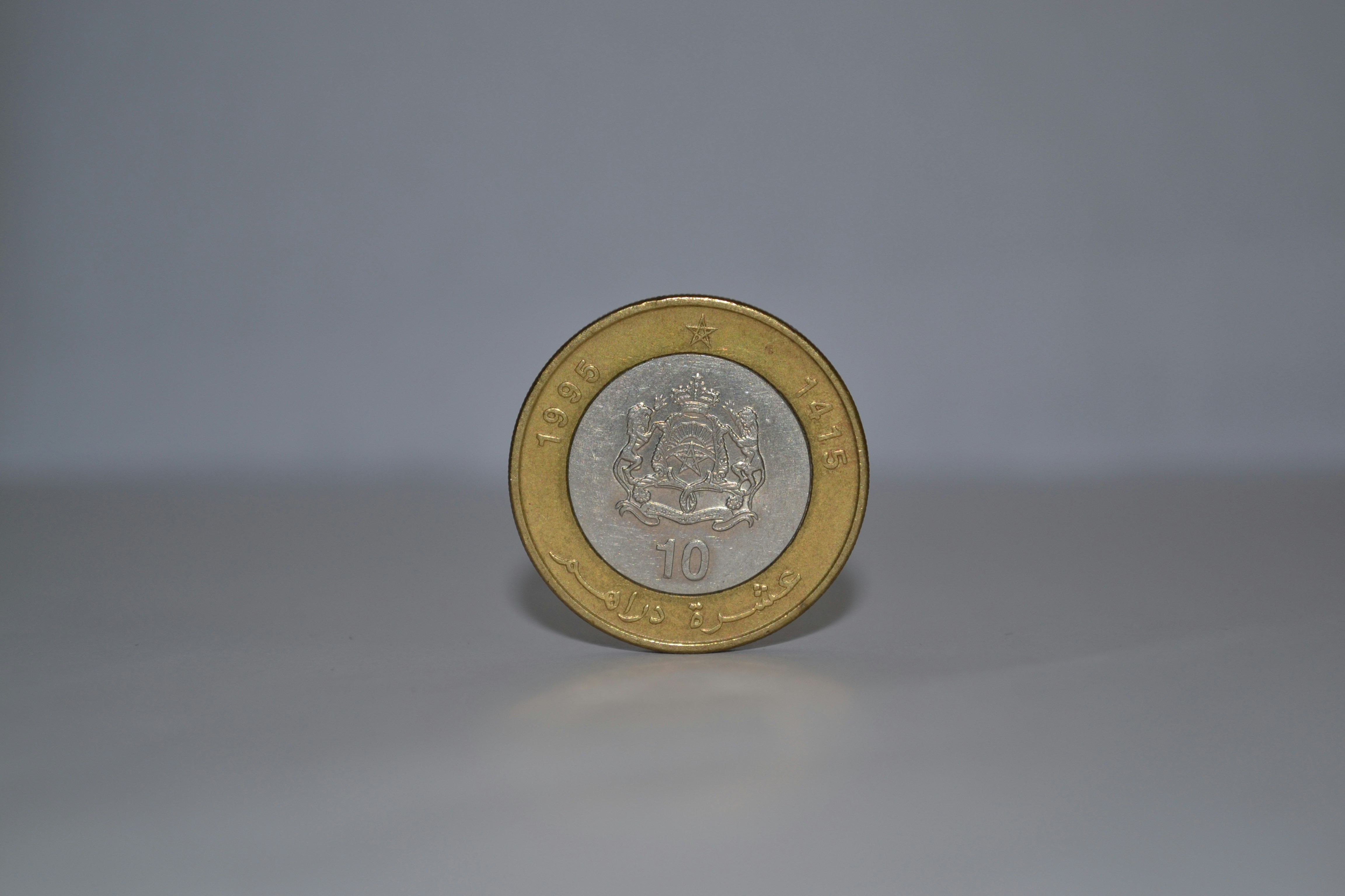 a close up of a coin on a table