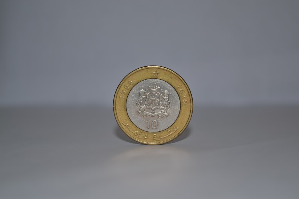 a close up of a coin on a table