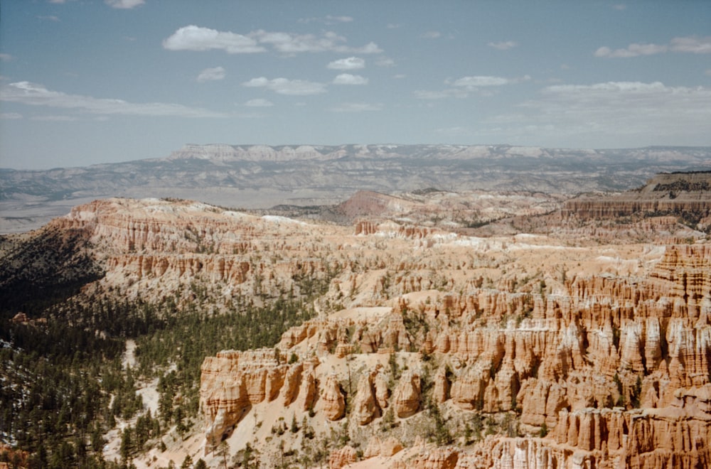 a scenic view of the mountains and trees