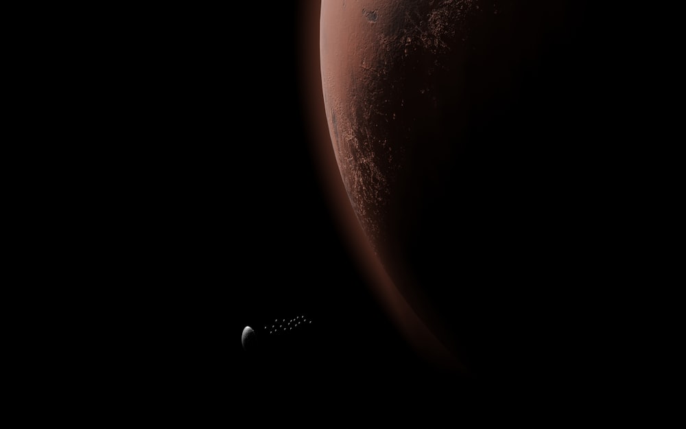 an artist's rendering of a red planet in space