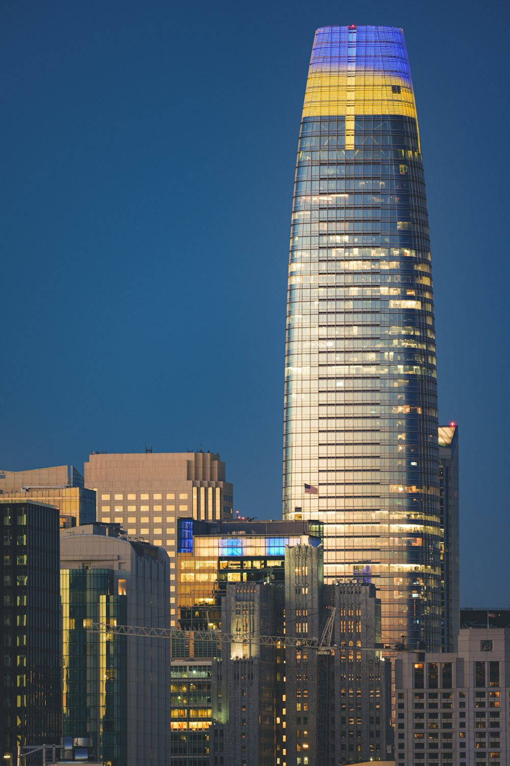 a very tall building in the middle of a city