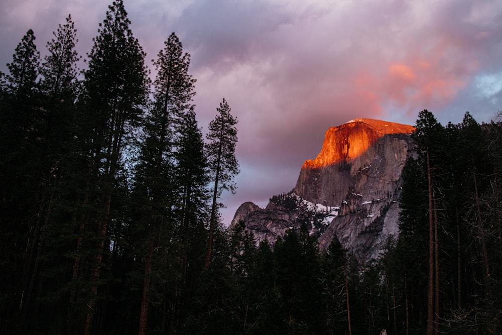 a mountain with a red light on top of it