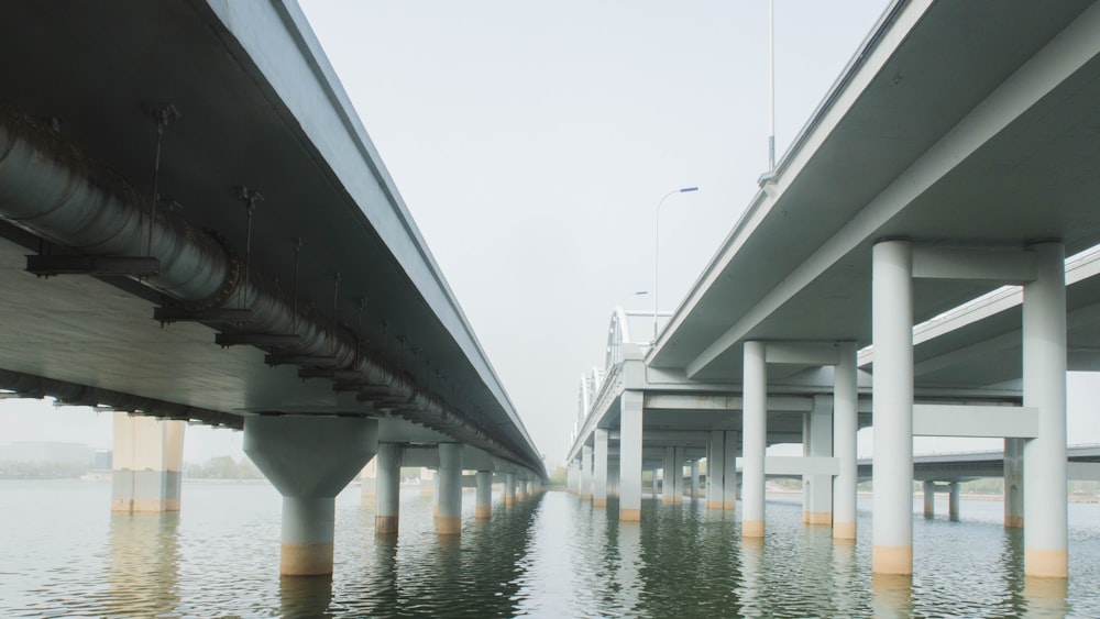 a view of a bridge over a body of water