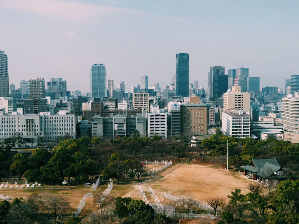 a view of a city with tall buildings