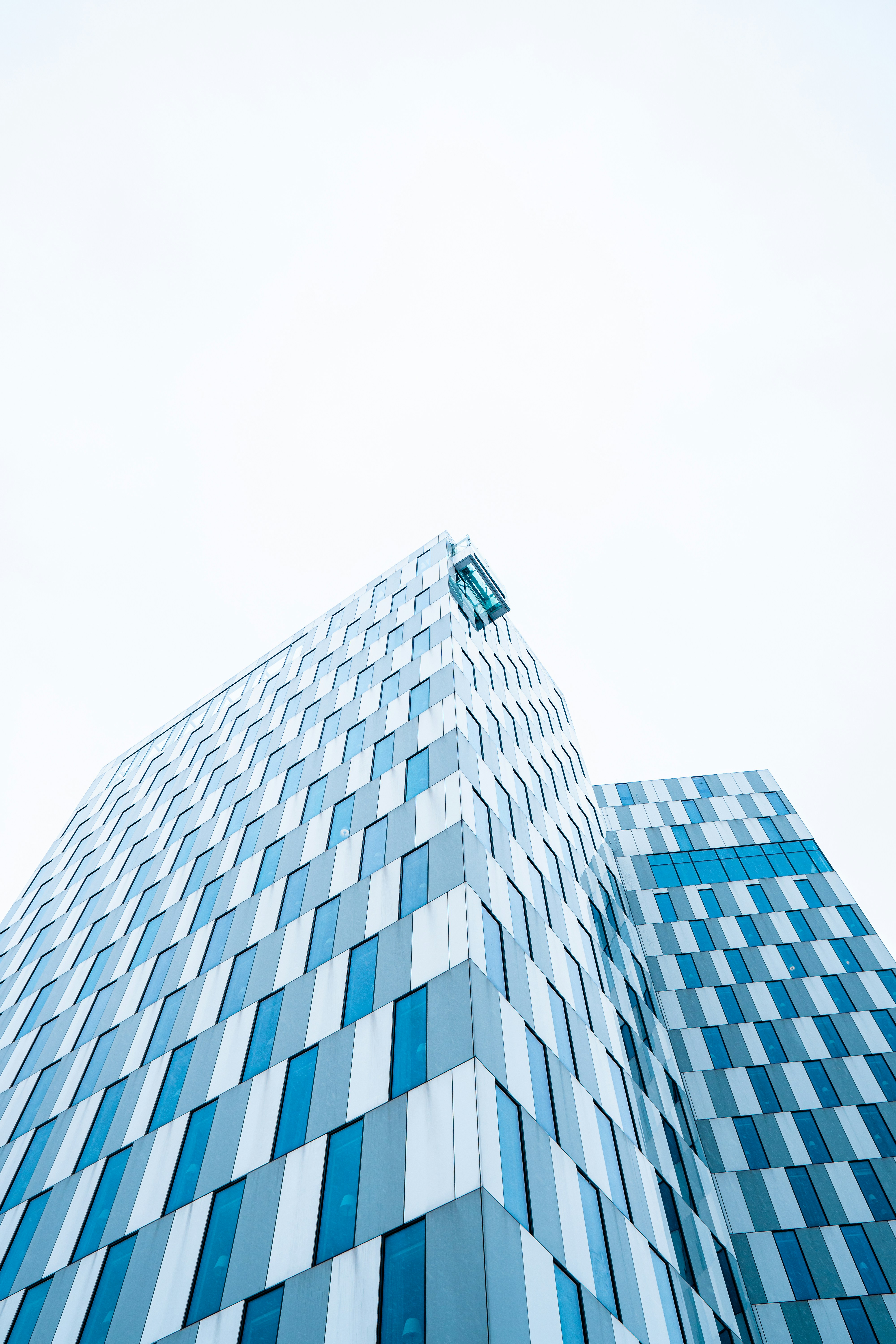 a very tall building with a clock on it's side