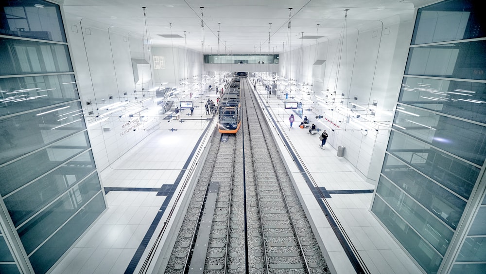 a train station with a train on the tracks