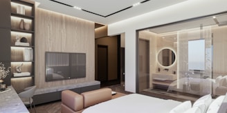 a bedroom with a large bed and a flat screen tv