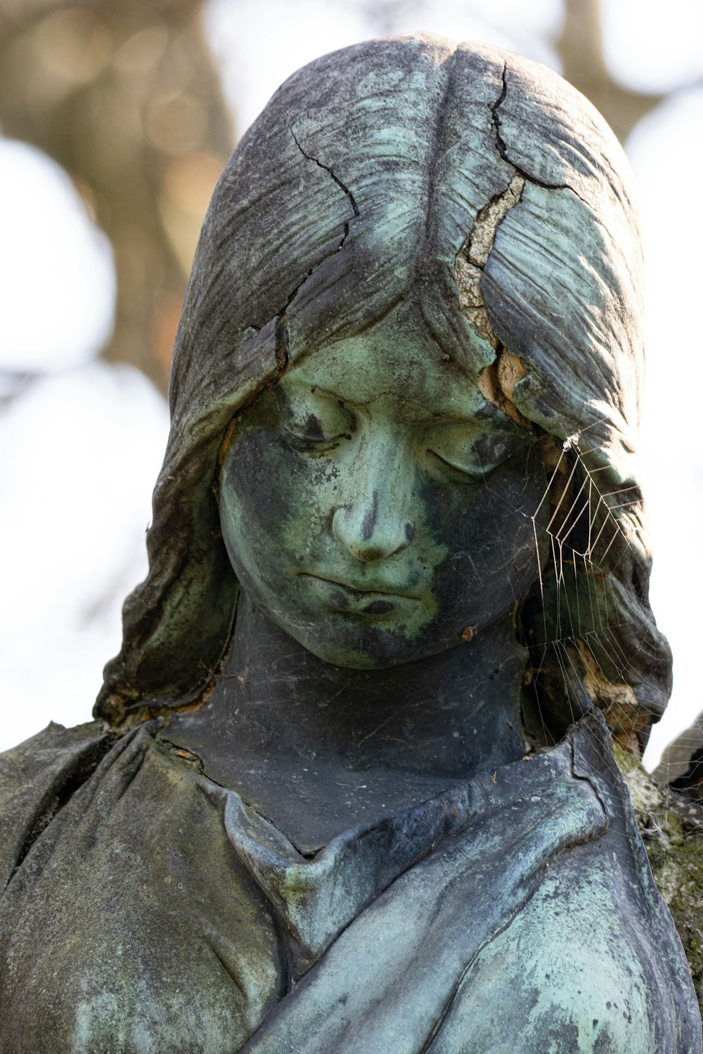 a close up of a statue of a woman