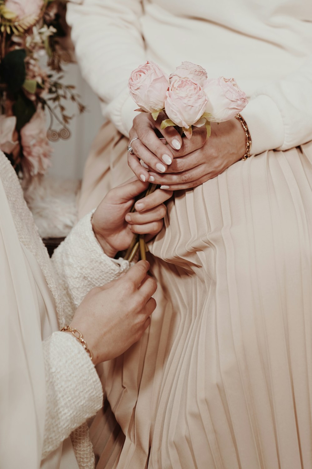 a couple of people that are holding flowers