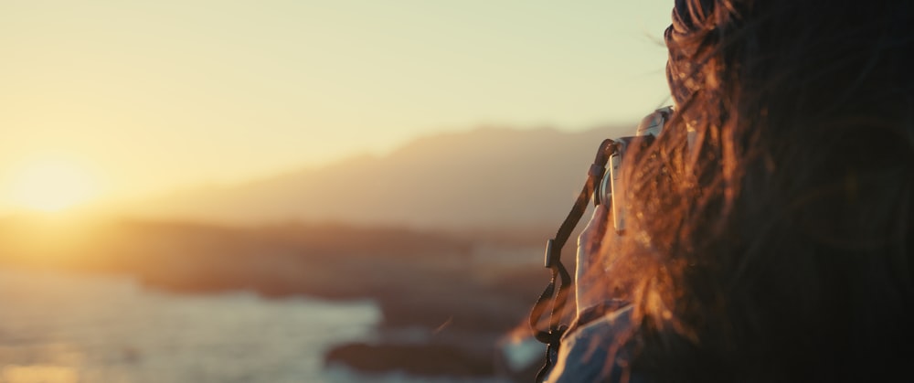 a close up of a person with long hair