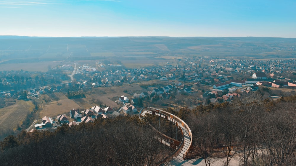 an aerial view of a town with a spiral staircase