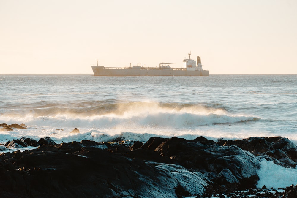 a large cargo ship sailing in the ocean