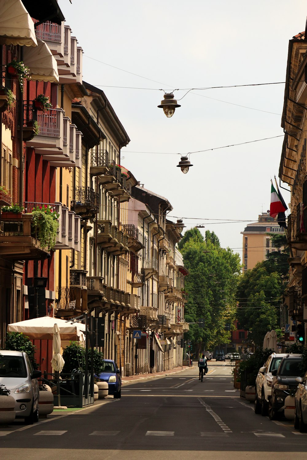 a street with cars parked on both sides of it