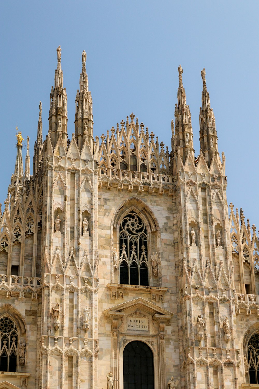 a large building with a clock on the front of it