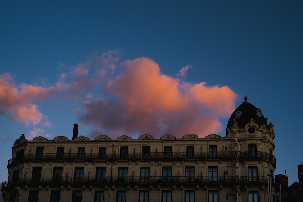 a building with a clock on the top of it