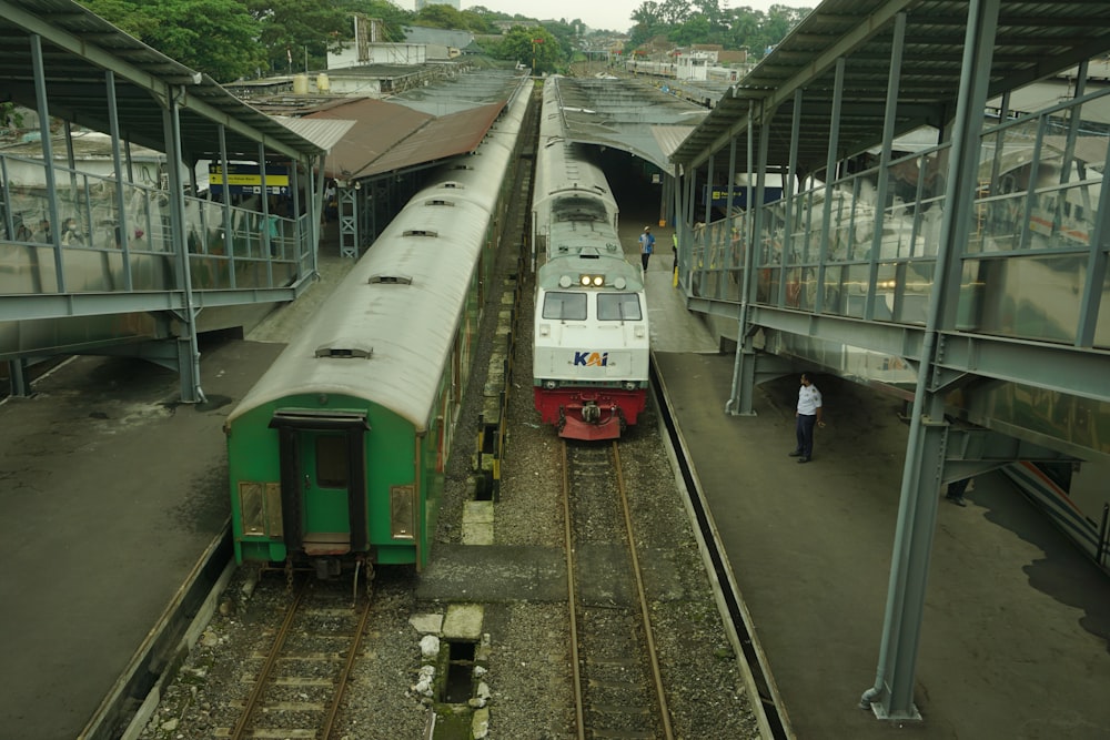 a couple of trains parked next to each other