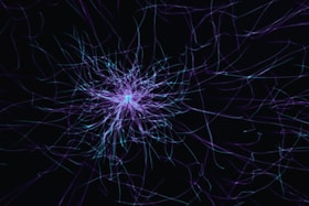 a purple and blue abstract pattern on a black background