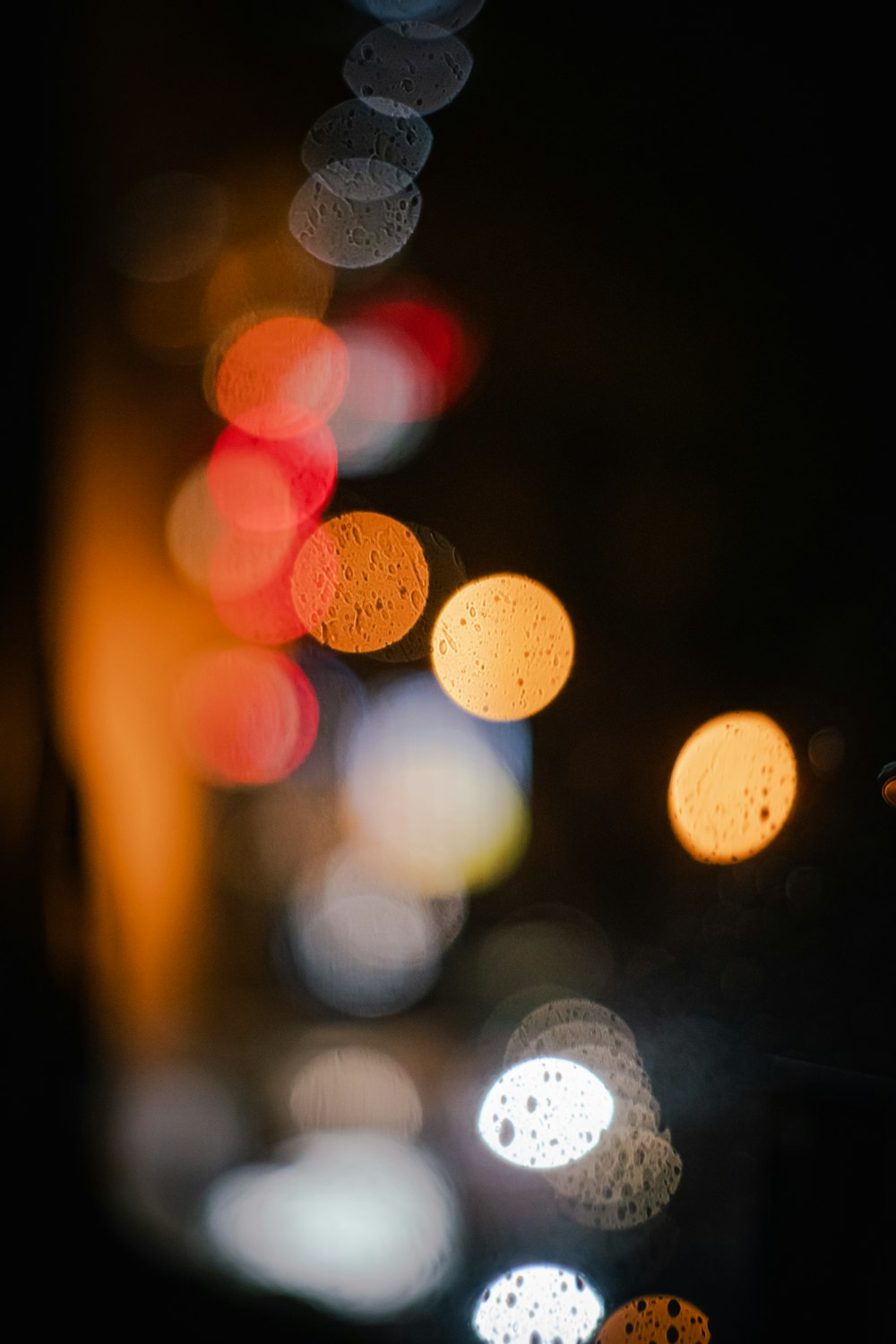 a blurry photo of a city street at night