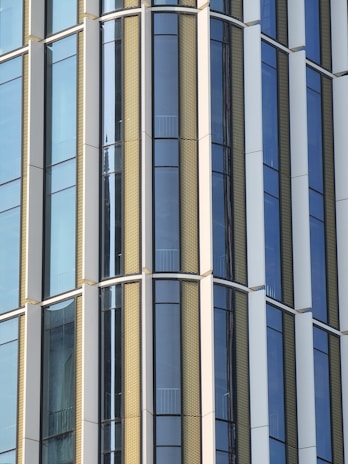 Detail of a commercial building’s aluminum window system showcasing clean lines and durable construction.