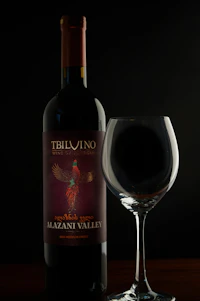 Georgian wine bottle and glass