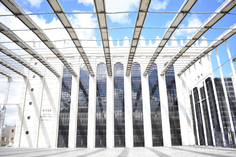 a large white building with a sky background