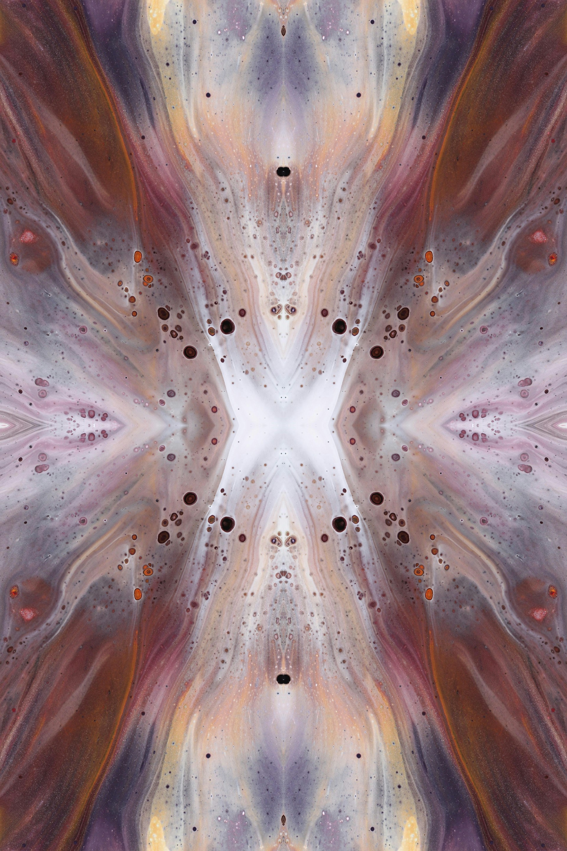 an abstract image of a flower with a white center