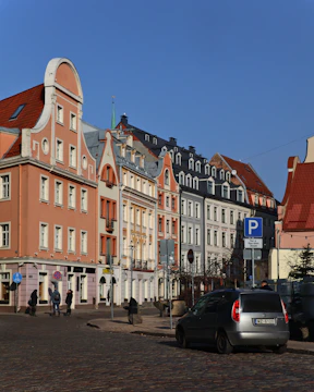 a row of buildings on a city street