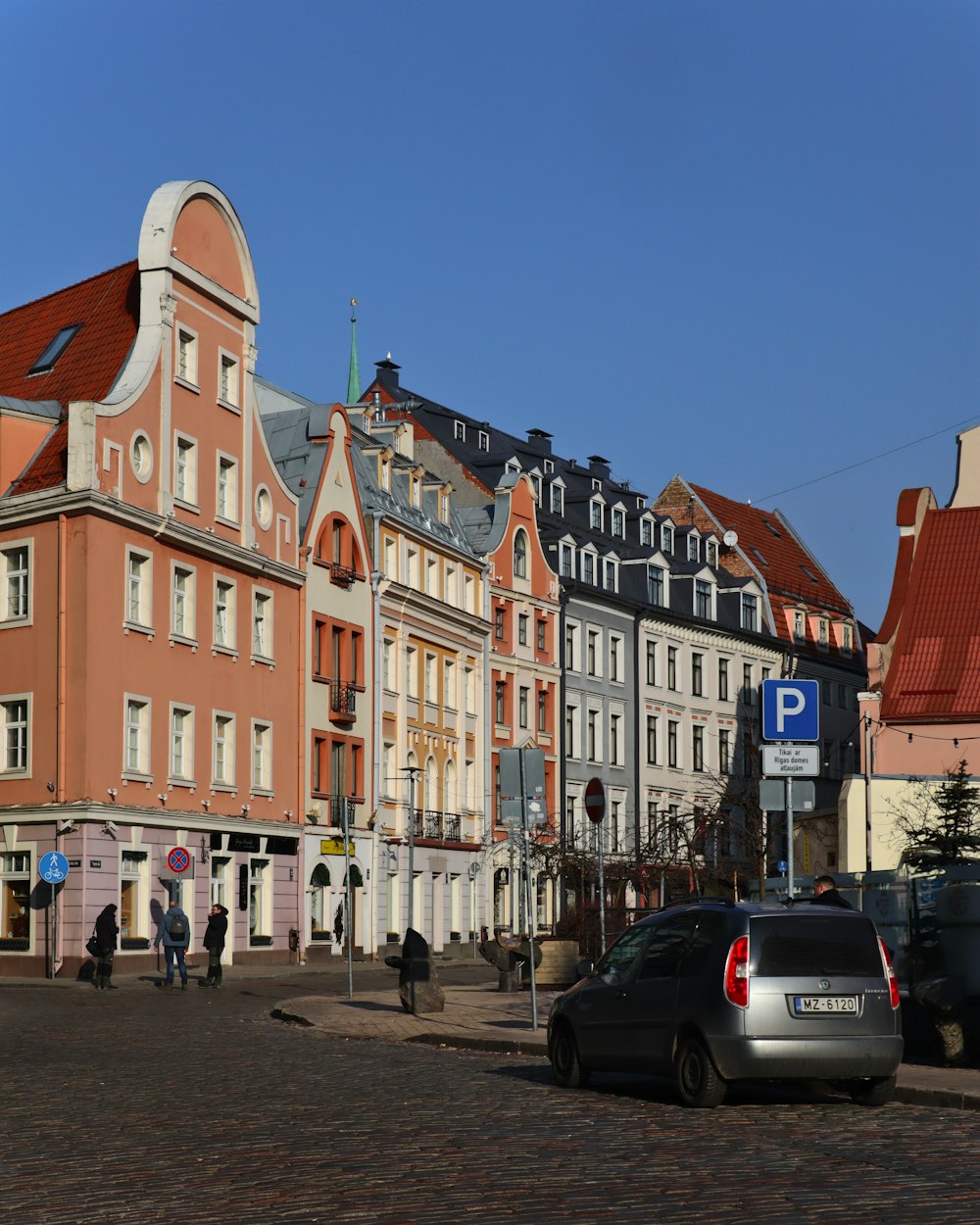 a row of buildings on a city street