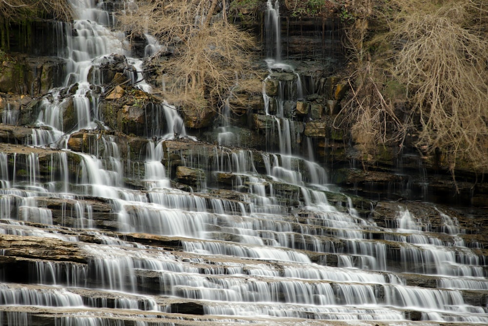 a large waterfall with lots of water coming out of it