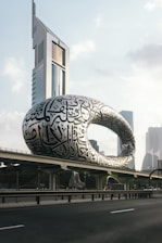 a large building with a giant snake on it's side