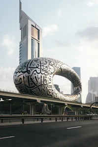 a large building with a giant snake on it's side